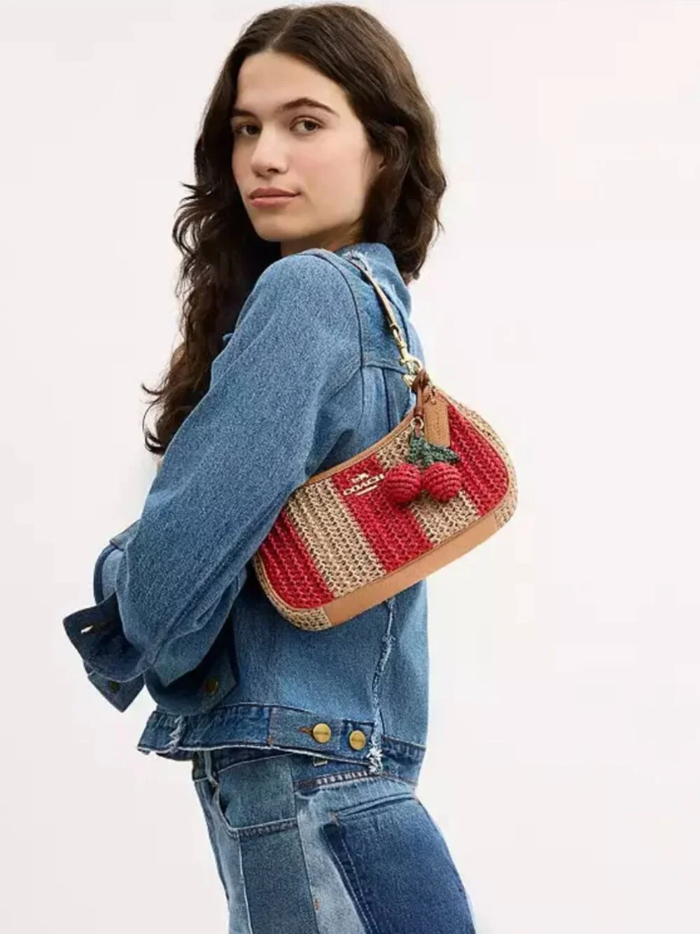 COACH teri shoulder bag with stripes and charm. gold/red/tan. item # cer34.